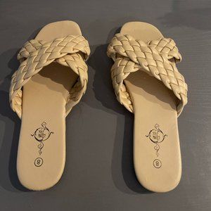 Tan sandals. SIze 8. I am not sure where they are from.